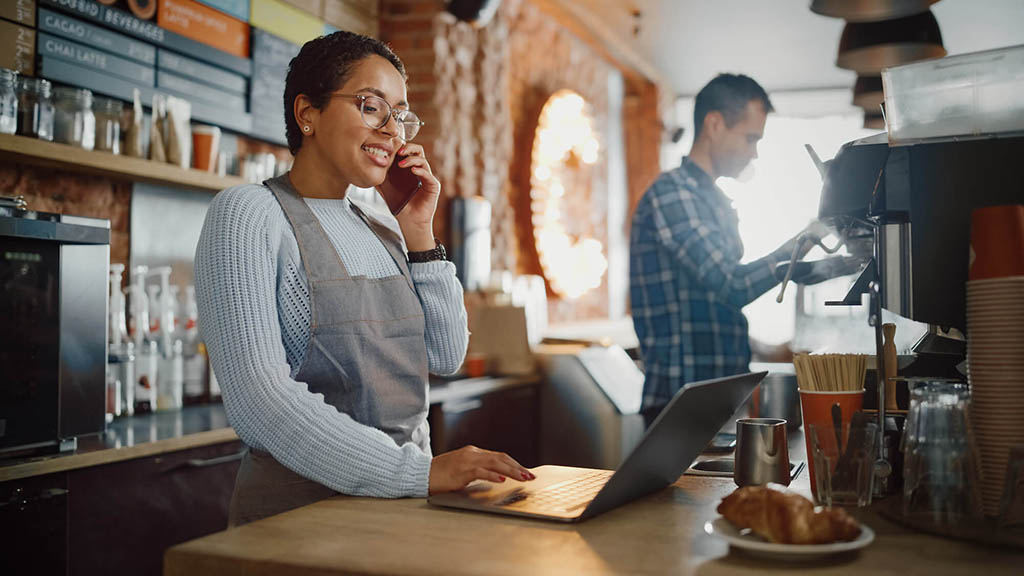 Woman on phone in coffee shop